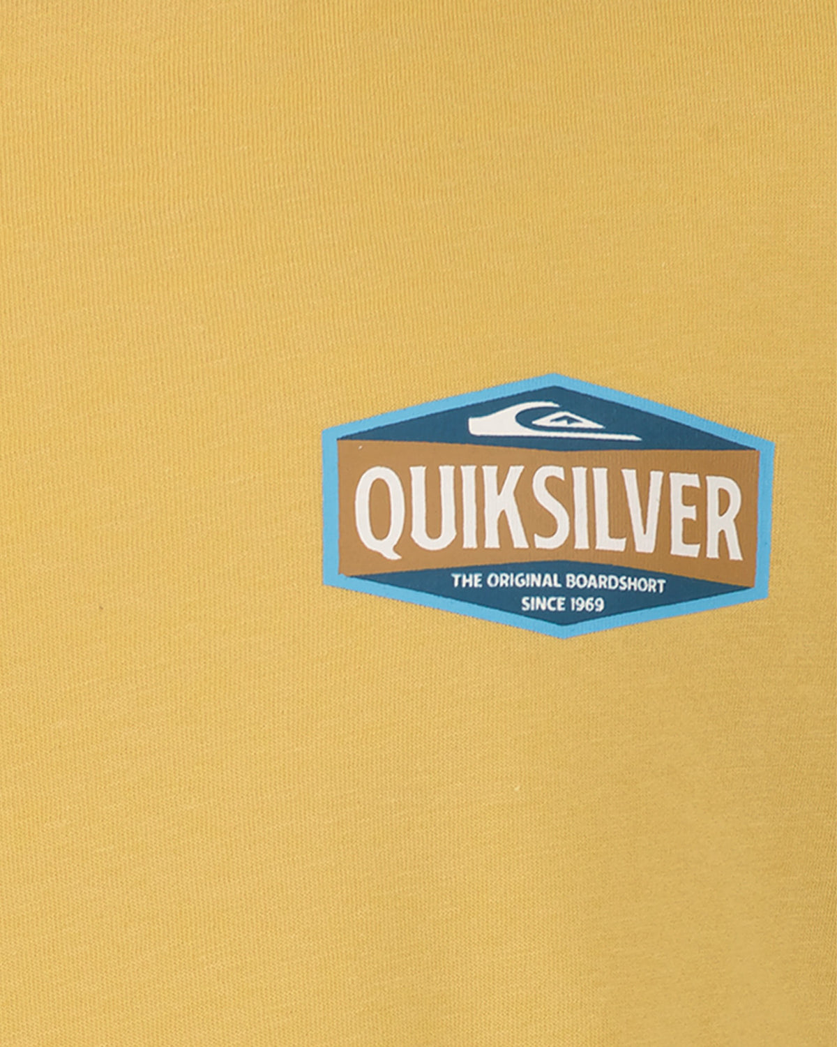 Quiksilver logo on a mustard yellow background