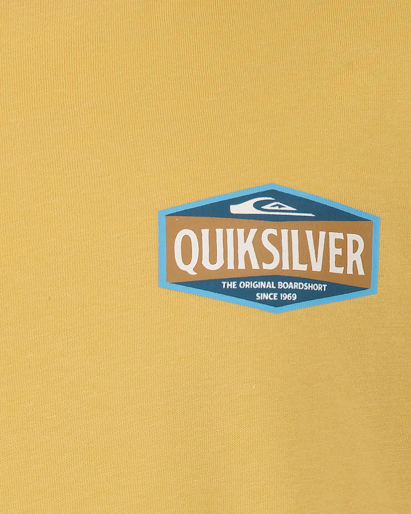 Quiksilver logo on a mustard yellow background