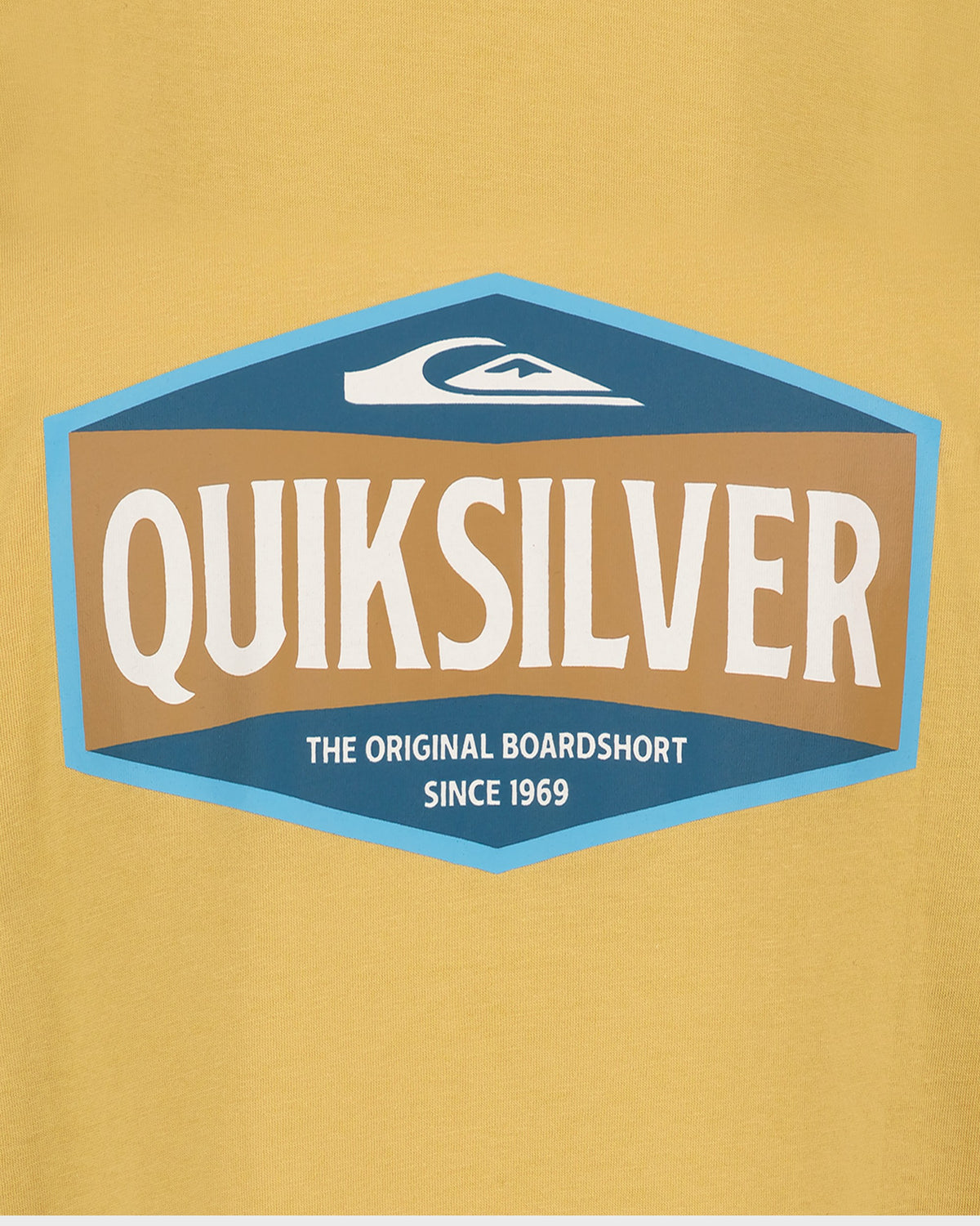 Quiksilver logo on a mustard yellow background