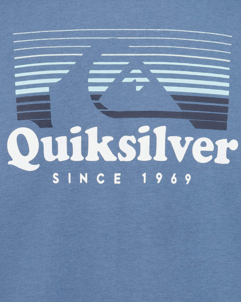 Blue t-shirt with Quiksilver logo and text on a blue background