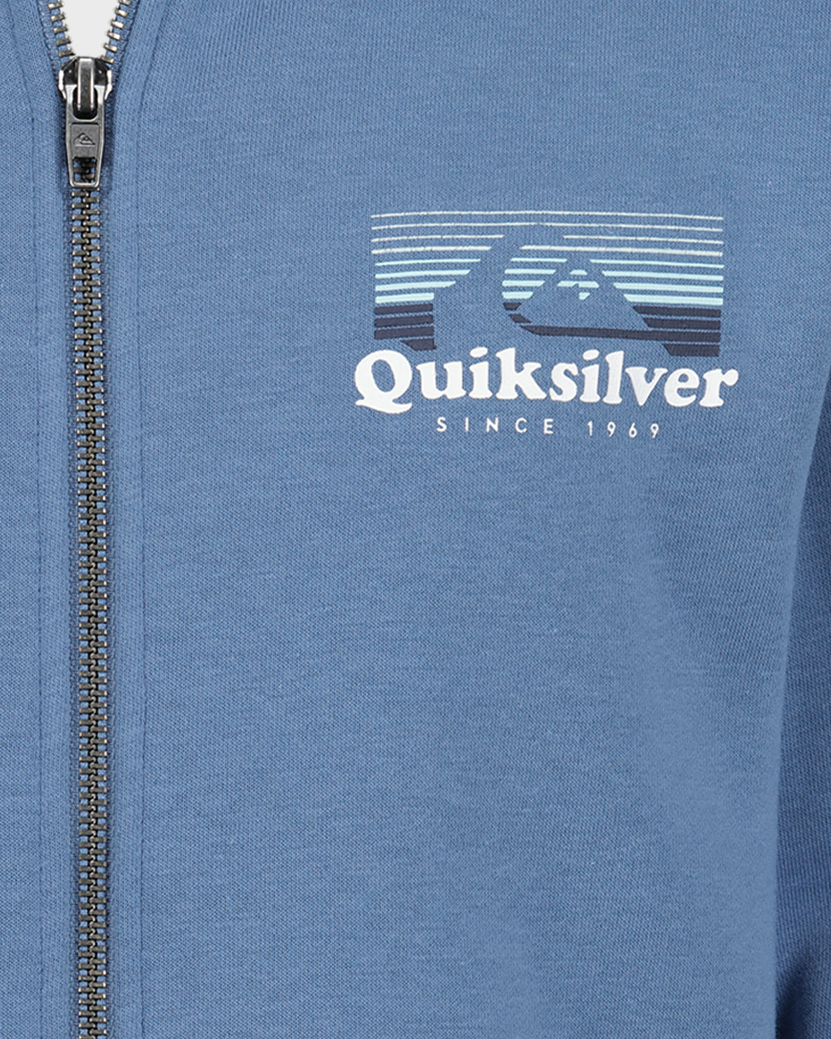 Blue jacket with Quiksilver logo and text on a close-up view