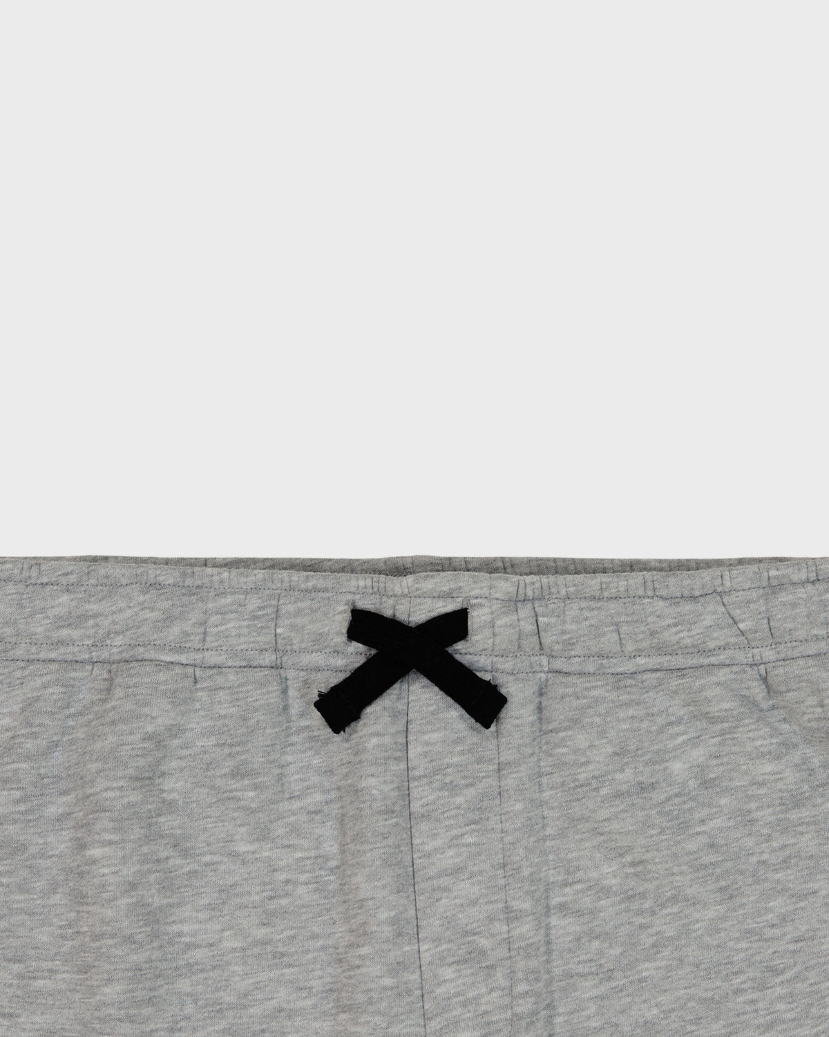 Gray sweatpants with a black logo on a white background