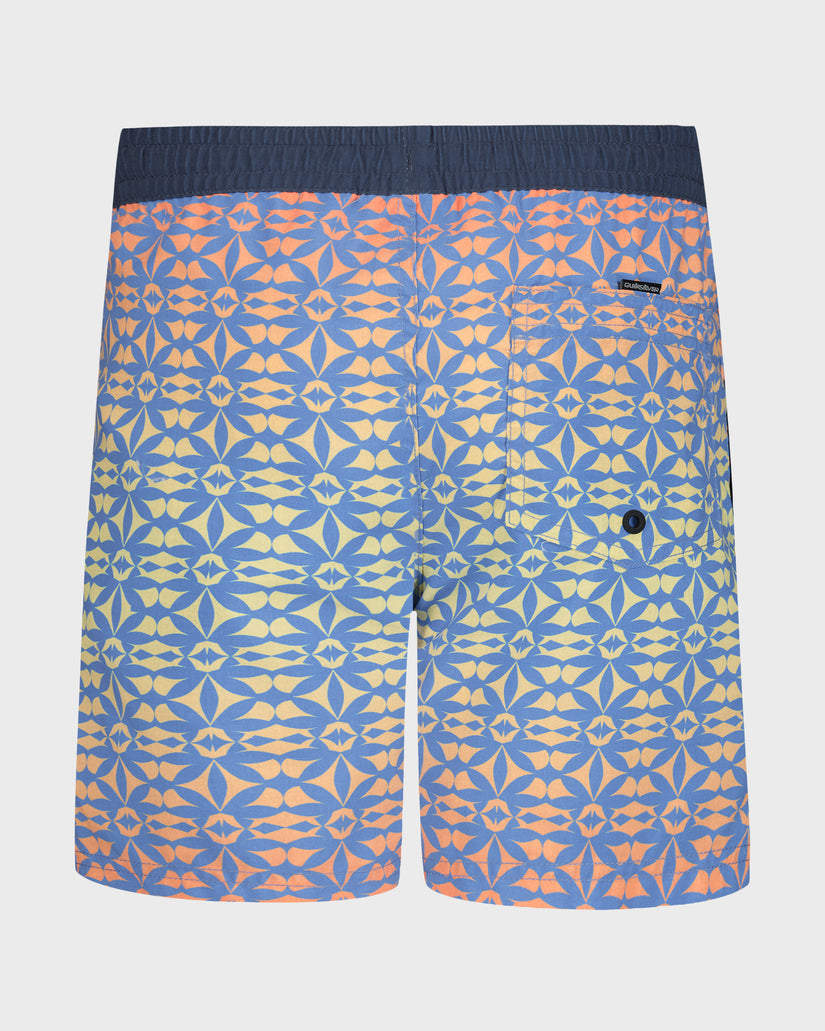 Blue swim shorts with orange and yellow geometric pattern on a white background