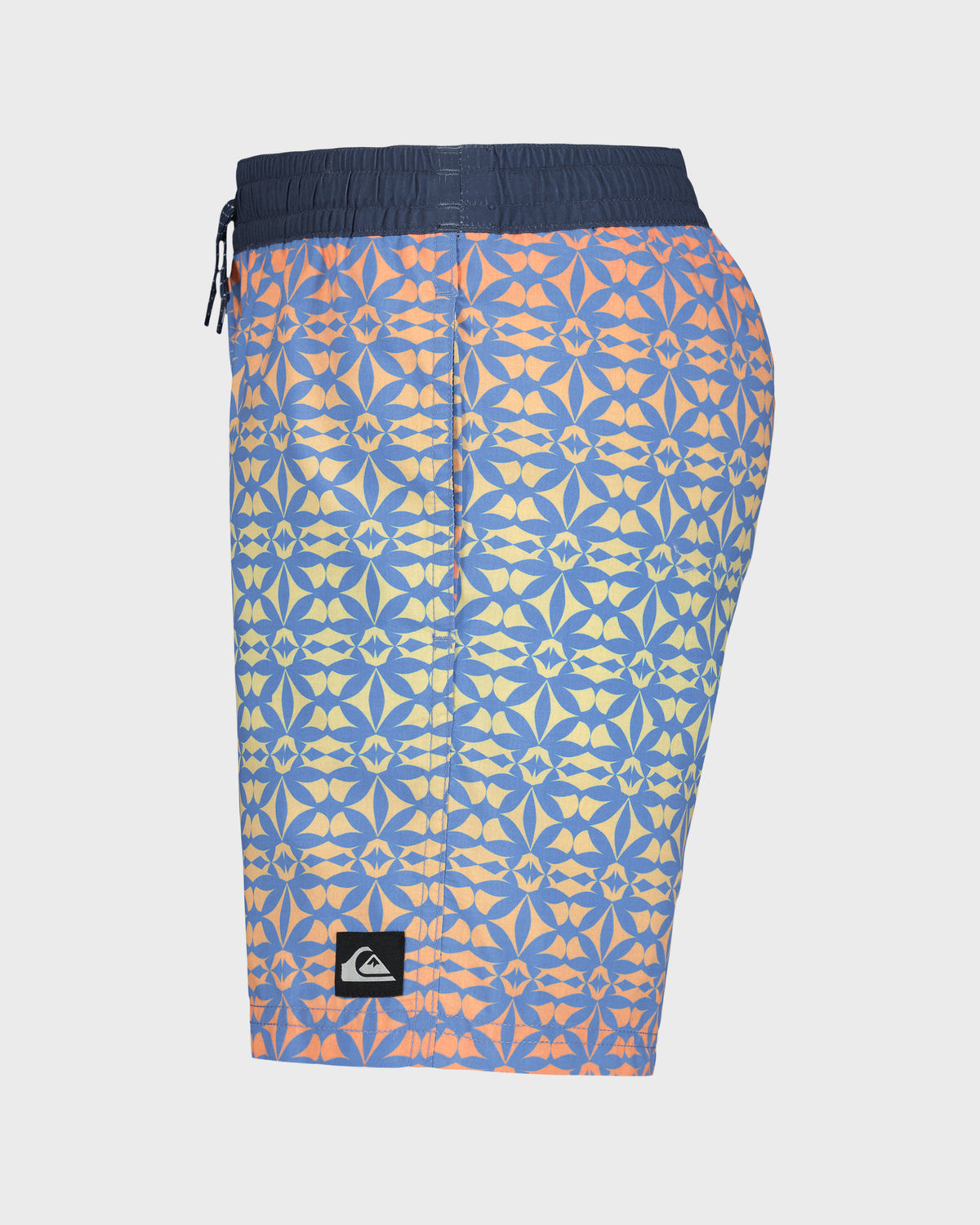Blue and orange patterned shorts with a visible brand logo on a light gray background