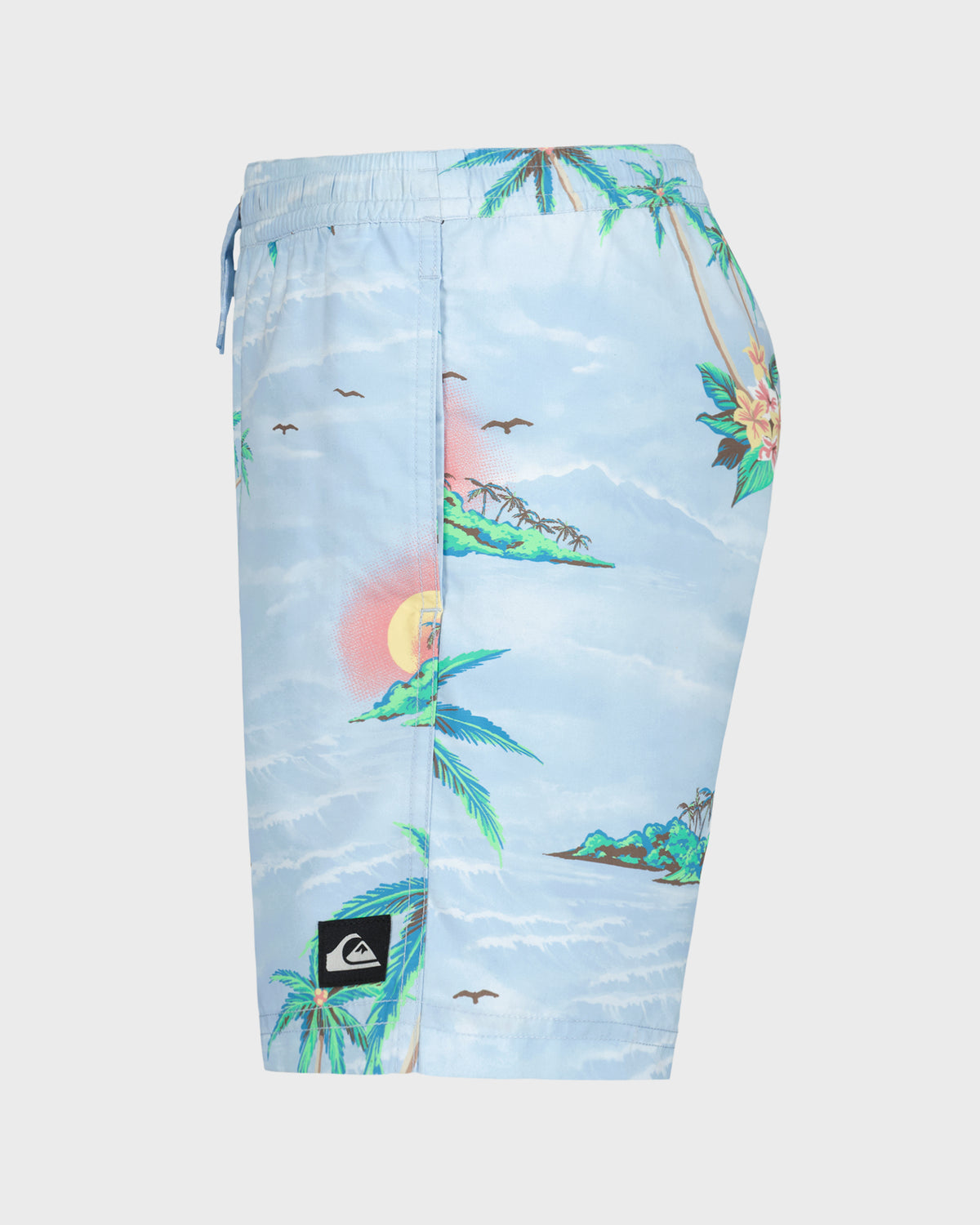 Board shorts with a tropical design featuring palm trees and birds on a light blue background.